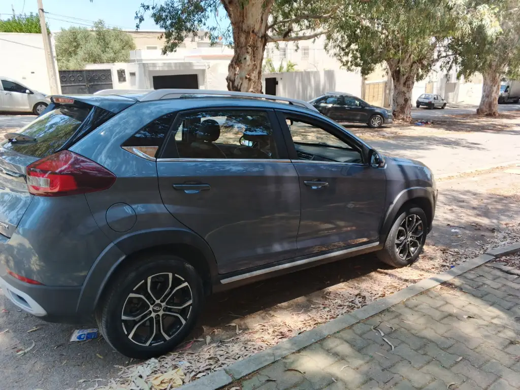 Chery Tiggo 3x - Photo 9