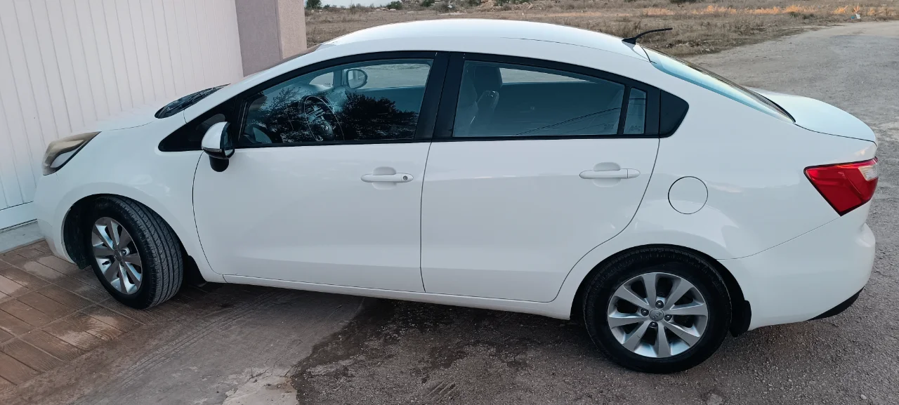 Kia RIO - Photo 5