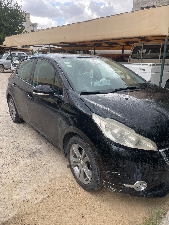 Peugeot 208 - Photo 11