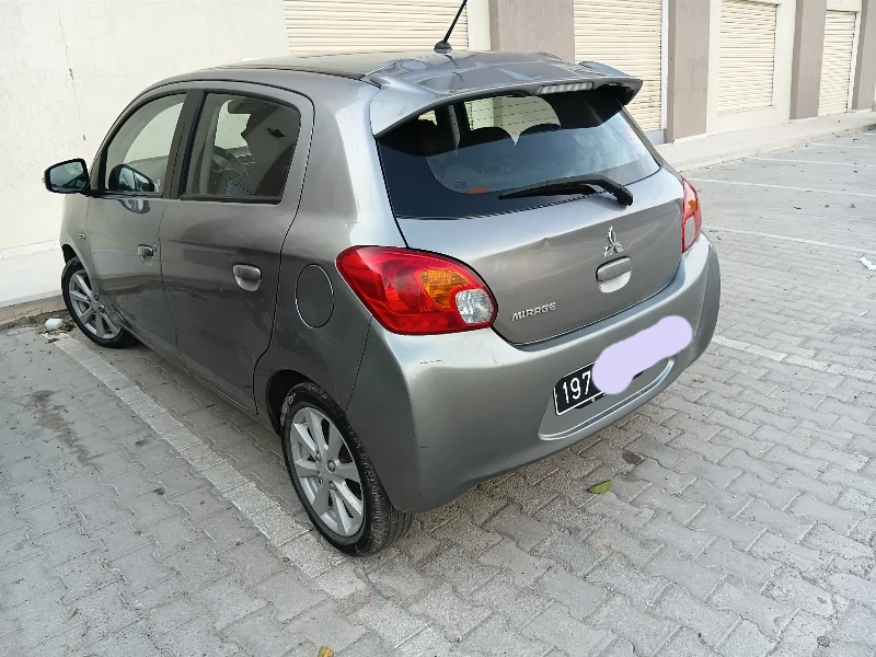 Mitsubishi Mirage - Photo 4