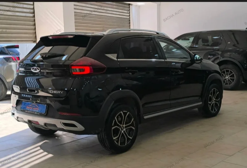Chery Tiggo 3x - Photo 9