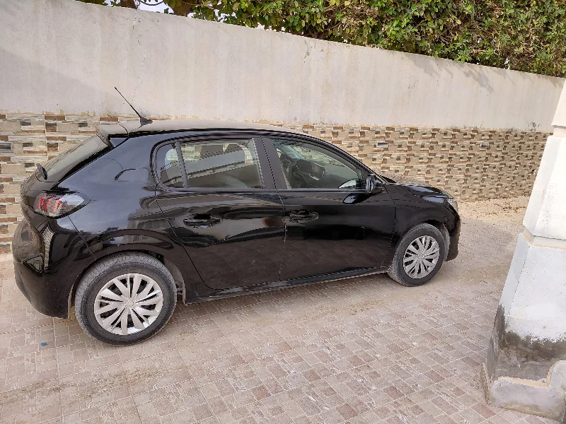 Peugeot 208 - Photo 12